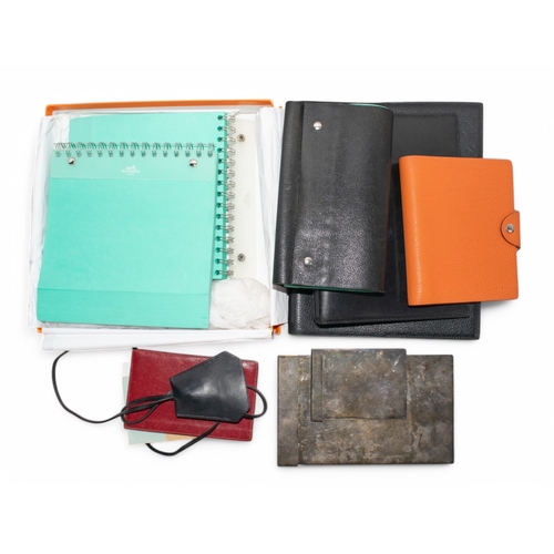 202 - Hermès, ParisA collection of leather stationery goods, to include:[a] A black soft leather no... 