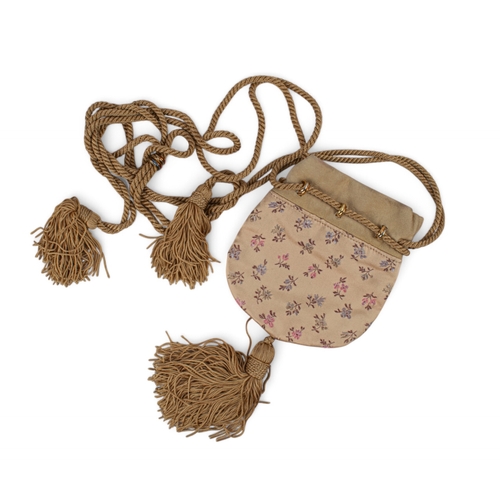 204 - CartierA silk, leather and gold evening pouch, of a pale gold colour with floral design. The rope ta... 