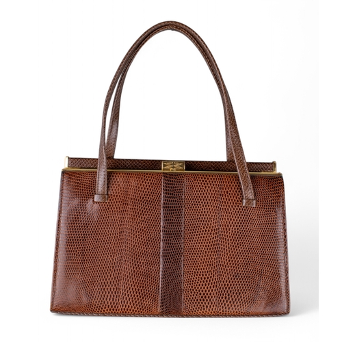 212 - Mappin & Webb, 1960sA vintage brown lizard skin handbag, with monogrammed 'M W' clasp and tan su... 