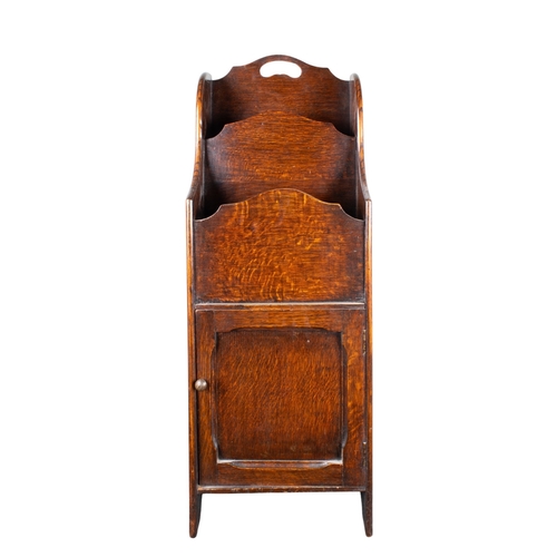 215 - British, 20th CenturyA mahogany magazine rack, with a bottom doorProperty of a gentlemanFrom the Pet... 