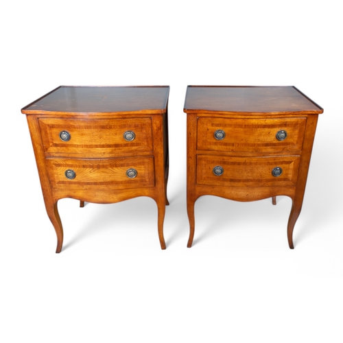 229 - RegencyA pair of two drawer bedside tables with medallion handles, on cabriole legsProperty of a gen... 