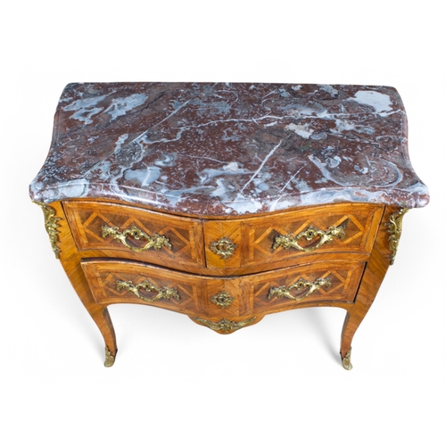 234 - FrenchLouis XV, mid-18th century A two drawer parquetry inlaid commode, gilt bronze mounted and... 