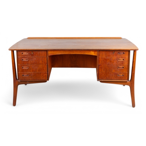 251 - Danish, Mid-CenturyA Svend Aage Madsen desk for H.P. HansenWith four drawers to each side and a lock... 