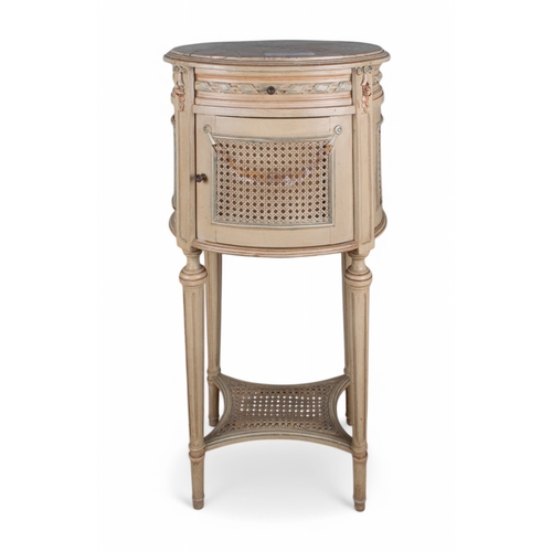 253 - Louis XV styleA hand-painted bedside table with marble topOn fluted legs, with wicker to the side an... 