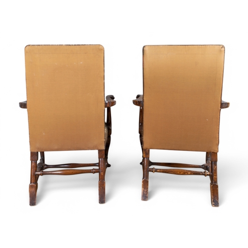 254 - 20th century,A pair of armchairs with embroidered upholsteryDamage to fabricDimensions:42 in. (H) x ... 