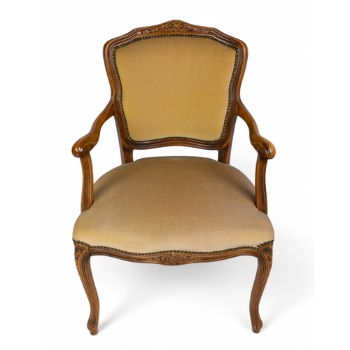 255 - A Louis XV style armchairUpholstered in modern pale yellow upholsteryTo be sold without reserveDimen... 