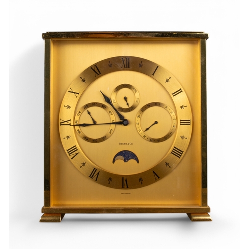 257 - Tiffany & CoClock with day date gilt metalWith Investcorp inscription to the topTogether with a&... 