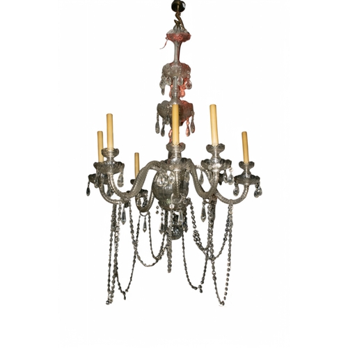 260 - 18th/19th centuryAn ornate rock crystal chandelier with  arms and pear shaped faceted bobeches.... 