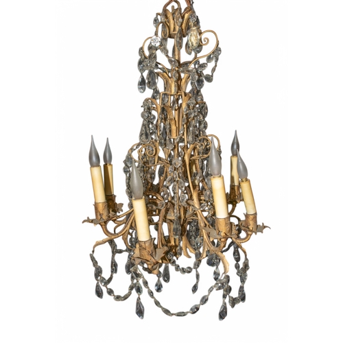 261 - A group of four lampsTo include:[a] A brass chandelier with six arms and foliate decorative pieces[b... 