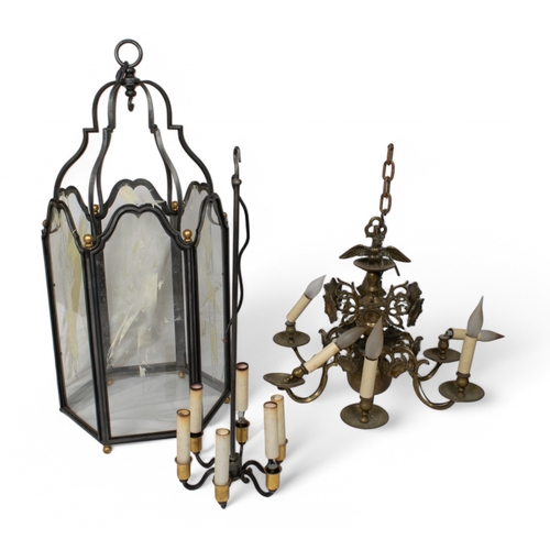 261 - A group of four lampsTo include:[a] A brass chandelier with six arms and foliate decorative pieces[b... 