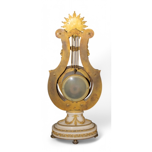 266 - French19th centuryFesteau Le JeuneA gilded ormolu and white marble mantle clock in the shape of a ly... 