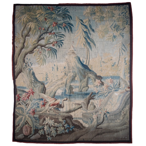 295 - FrenchEarly 18th CenturyA large verdure chinoiserie Aubusson tapestryWith an exotic bird in a river ... 