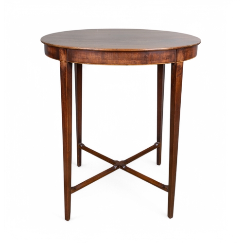 311 - RegencyAn oval topped occasional table with satinwood stringingFour tapered legs with a low stretche... 