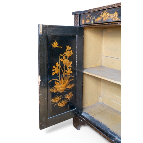 312 - ChineseLate 18th/Early 19th centuryBlack lacquered side cabinetDecorated in chinoiserie Enclose... 