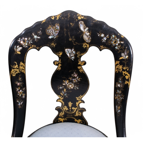 319 - VictorianA pair of black lacquered papier mache chairsInlaid with insects and flowers in mother of p... 