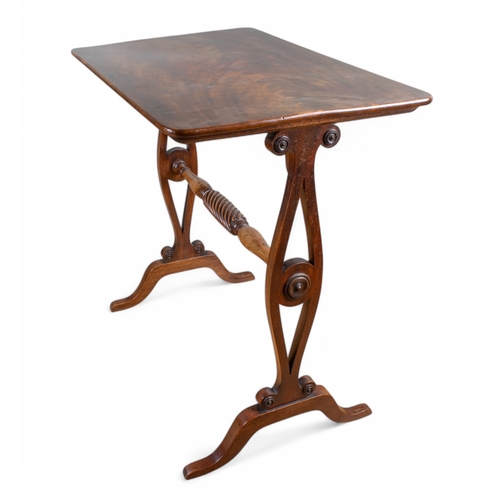 322 - RegencyA mahogany side tableThe rectangular top on pierced end and dual supportsUnited by spiral ree... 