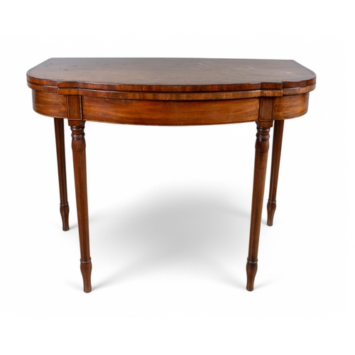 325 - RegencyAn unusually shaped fold-over card table, in mahogany with ebony and satinwood stringingFrom ... 