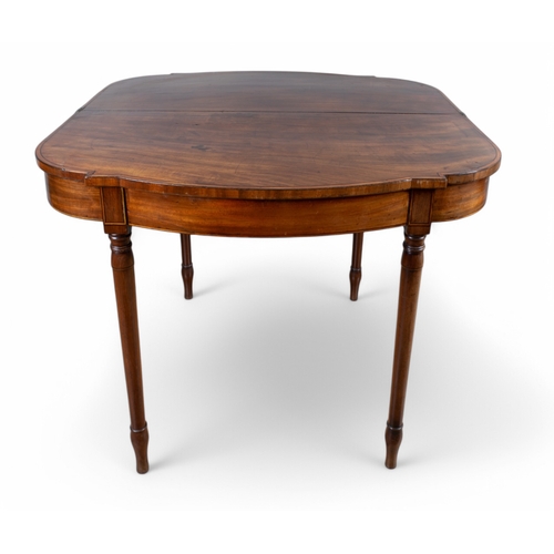 325 - RegencyAn unusually shaped fold-over card table, in mahogany with ebony and satinwood stringingFrom ... 