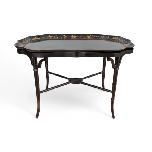 326 - Three black lacquered papier-mâché occasional tables with painted and gilded ornament[a] One of rect... 