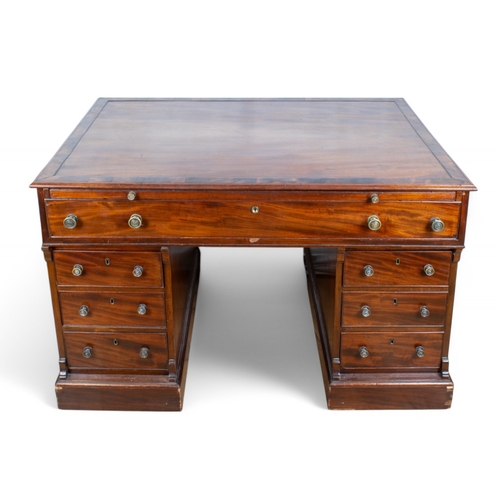 329 - Victorian or earlierA large mahogany partners desk. The upper part with one long drawer and pull-out... 