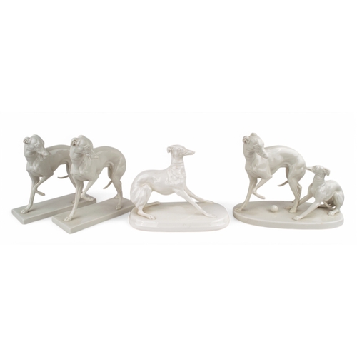 335 - AntiqueA set of four porcelain Italian Greyhounds[a] An Italian Greyhound stretching, stamped and si... 