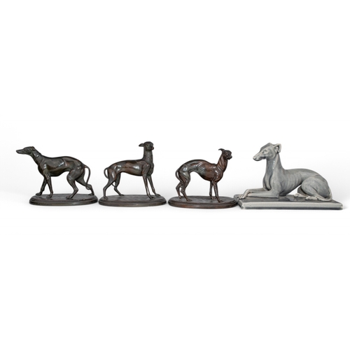 338 - AntiqueThree coal painted/resin standing Italian GreyhoundsTogether with a Mintons, lying down Itali... 