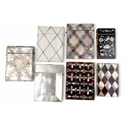 355 - 19th centuryA set of 7 geometric card casesWith hinged lids6 with mother of pearl inlay panels ... 