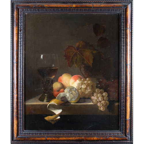 359 - Dutch17th CenturyStill life with goblet of wine, lemon, grapes and peachesOil on canvas From th... 