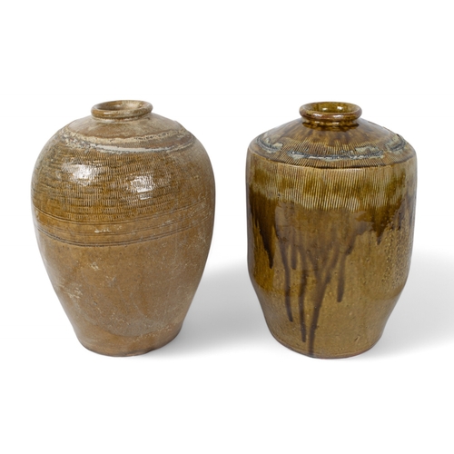 604 - ChineseTwo very large Chinese storage jars Glazed stoneware Impressed marks not relating t... 