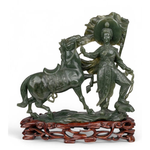 606 - A huge nephrite sculpture of eight horses on a wood standBought at Asprey and with a signed Asprey v... 