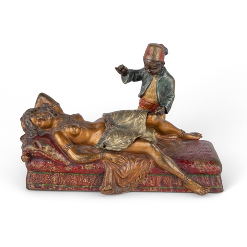 630 - AustrianCirca 1900A cold painted bronze orientalist sculpture of a nubile sleeping lady of the harem... 