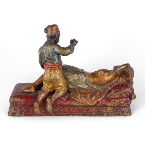 630 - AustrianCirca 1900A cold painted bronze orientalist sculpture of a nubile sleeping lady of the harem... 