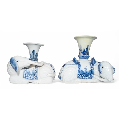 706 - Chinese, 18th centuryTwo blue and white vases, designed as recumbent elephants. (As found)Dimensions... 