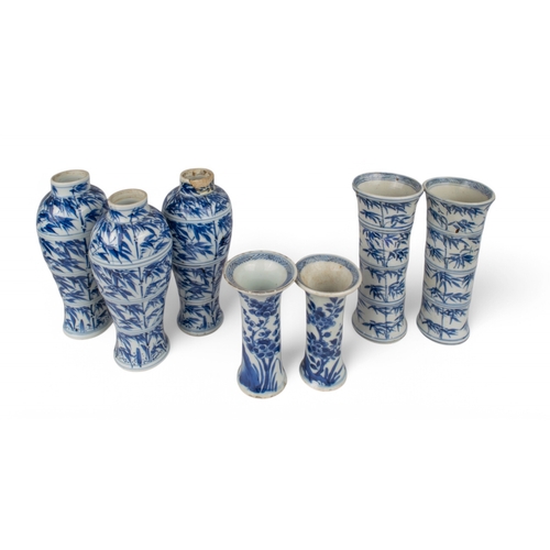 707 - Chinese, 18th centuryA group of five bamboo decorated vases. Including a small pari of sleeve vases,... 