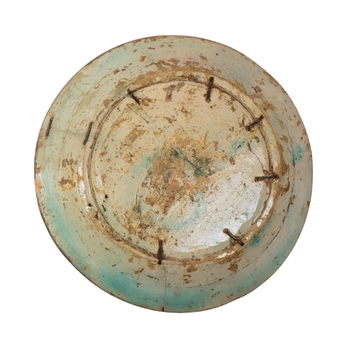 714 - Provincial Persian, Nishapur (?)10 century or later (?)A large glazed chargerDimensions:14 in. (D)... 