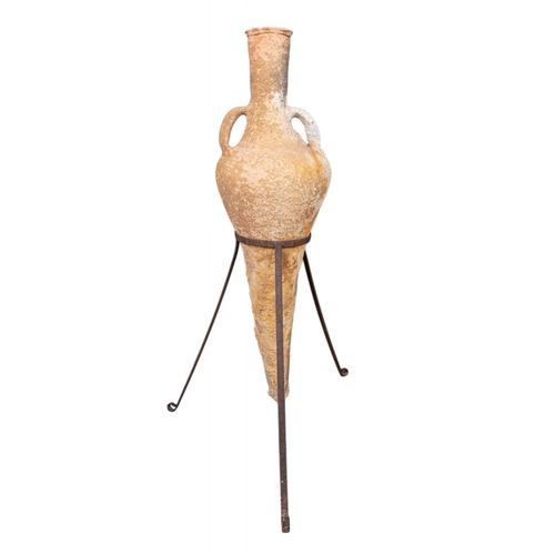 599 - Graeco-RomanAn amphora, with a tapering piriform body, a cylindrical neck with a slightly flared rim... 