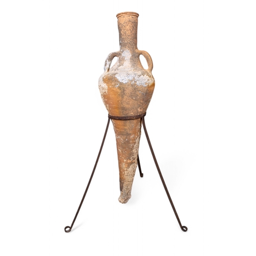 599 - Graeco-RomanAn amphora, with a tapering piriform body, a cylindrical neck with a slightly flared rim... 