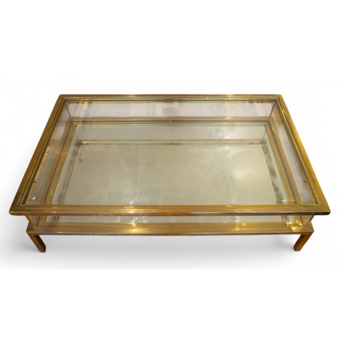 236 - Near ContemporaryA brass and glass coffee tableWith viewing chamber for objectsProperty of a noblema... 