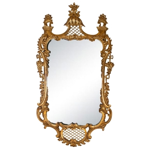 277 - 18th centuryA carved and gilded mirror, with early plateDimensions:142 cm. (H) x 80 cm. (L)... 