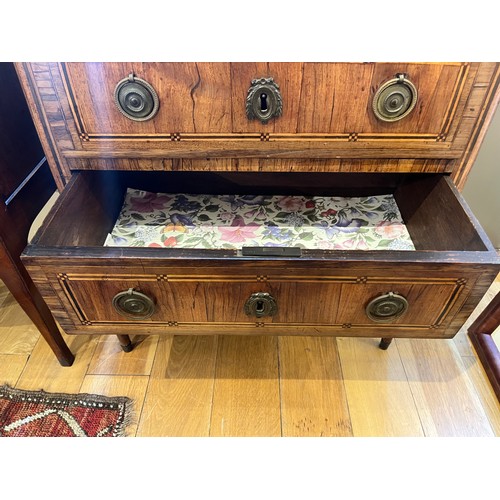 226 - French18th centuryA parquetry inlaid petite chest of drawers, with marble top above three drawers wi... 