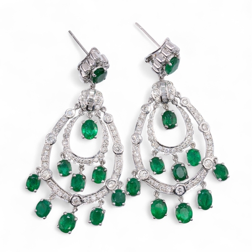 60 - ContemporaryA pair of emerald and diamond pendant earrings, composed of two-row drops with nine flex... 