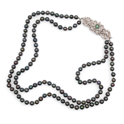 65 - Continental, 1980sA two-row black coloured cultured pearl necklace. The pearls measuring 2.68mm. Wit... 