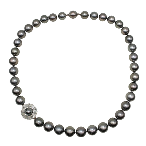 66 - Tahitian black cultured pearls, in a slightly graduated row of thirty-seven 10mm to 12mm pearls, wit... 