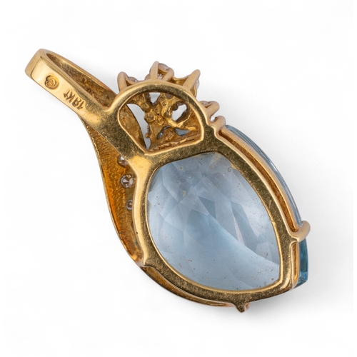 89 - Circa 1990sAn aquamarine and diamond pendant. The leaf-shaped briolette-cut aquamarine within a bril... 