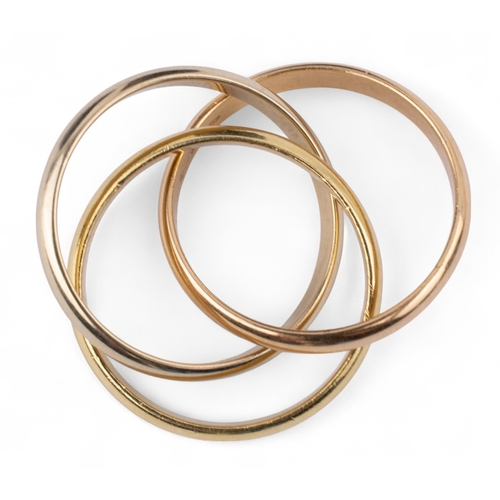 108 - ItalianA Russian wedding ring, composed of white, rose and yellow gold bandsFinger size: MTotal weig... 