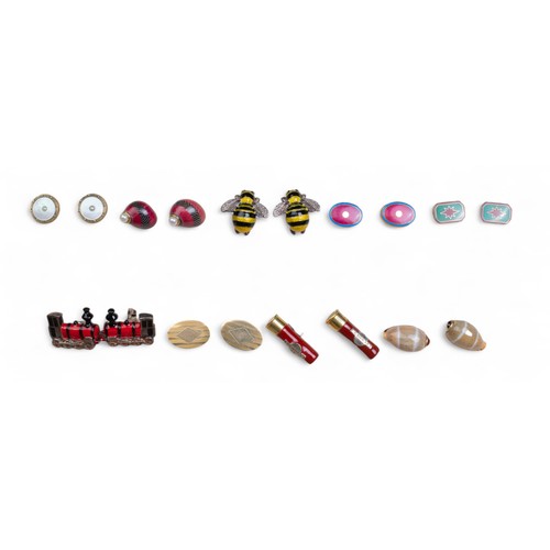 130G - A group of nine cufflinksTo include:[a] Purdey, Cartridge-shaped silver cufflinks, hallmarked Birmin... 