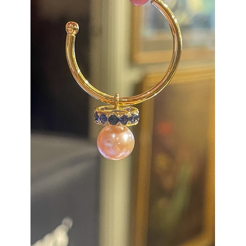 28 - A pair of 18 carat gold, sapphire, and cultured pearl hoop earringsWeight: 5.01 grams approximately... 