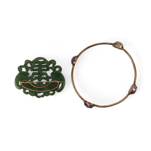 30 - Liberty and Co, A Chinese nephrite brooch with gold mountsIn the style of a Shuangxi 'double happine... 