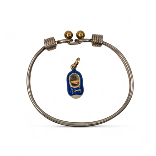 37 - Tiffany & Co, A silver double coil ball bangleTogether with an 18k gold and enamel slipper penda... 