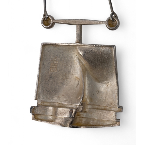 45 - Finnish, 1970sA silver Bj&ouml;rn Weckstr&ouml;m abstract pendant on a bar-chain back.Total weight: ... 
